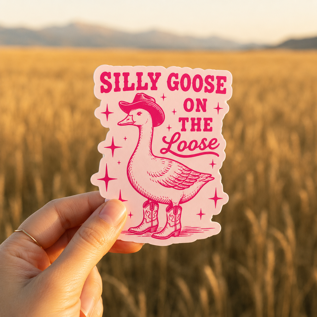 Silly Goose on the Loose magnet held in hand