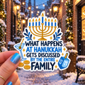 What Happens at Hanukkah Gets Discussed by the Entire Family sticker, shown in use